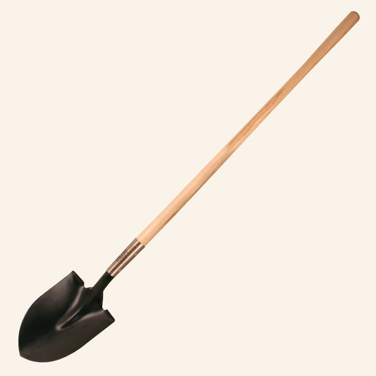 Black garden shovel with a wooden handle on a white background